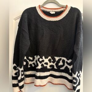 Hem & Thread Black and White Sweater with Orange Accents